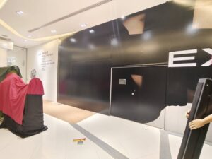 รับพิมพ์สติ๊กเกอร์ติดผนัง Hoarding